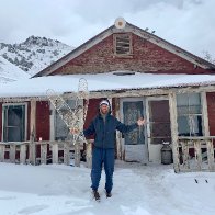 After buying an entire abandoned ghost town in California, a man is stuck out there due to a snowstorm and the coronavirus