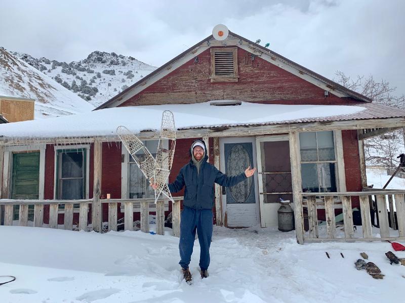 After buying an entire abandoned ghost town in California, a man is stuck out there due to a snowstorm and the coronavirus